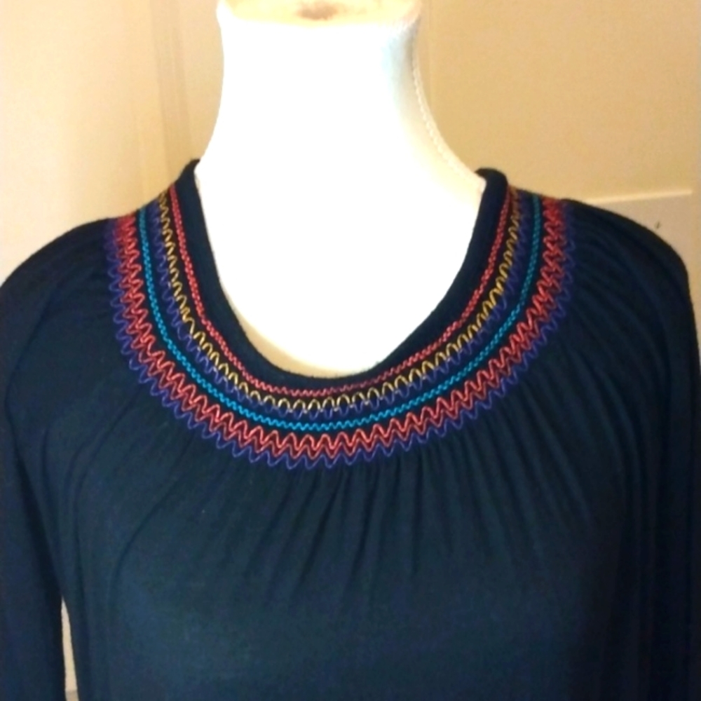 Miley Cyrus black top with smocking @ neck, sleeves and hem.  Medium top, EUC
